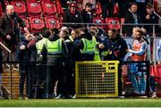 5 May 2025; St Patrick's Athletic backroom staff and Derry City stewards during the closing stages of the SSE Airtricity Men's Premier Division match between Derry City and St Patrick's Athletic at The Ryan McBride Brandywell Stadium in Derry. Photo by Stephen McCarthy/Sportsfile