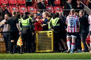5 May 2025; St Patrick's Athletic backroom staff and Derry City stewards during the closing stages of the SSE Airtricity Men's Premier Division match between Derry City and St Patrick's Athletic at The Ryan McBride Brandywell Stadium in Derry. Photo by Stephen McCarthy/Sportsfile