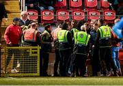 5 May 2025; St Patrick's Athletic backroom staff and Derry City stewards during the closing stages of the SSE Airtricity Men's Premier Division match between Derry City and St Patrick's Athletic at The Ryan McBride Brandywell Stadium in Derry. Photo by Stephen McCarthy/Sportsfile