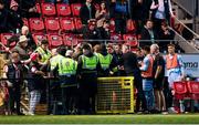 5 May 2025; St Patrick's Athletic backroom staff and Derry City stewards during the closing stages of the SSE Airtricity Men's Premier Division match between Derry City and St Patrick's Athletic at The Ryan McBride Brandywell Stadium in Derry. Photo by Stephen McCarthy/Sportsfile