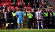 5 May 2025; St Patrick's Athletic backroom staff and Derry City stewards during the closing stages of the SSE Airtricity Men's Premier Division match between Derry City and St Patrick's Athletic at The Ryan McBride Brandywell Stadium in Derry. Photo by Stephen McCarthy/Sportsfile