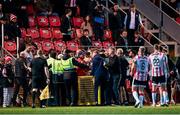 5 May 2025; St Patrick's Athletic backroom staff and Derry City stewards during the closing stages of the SSE Airtricity Men's Premier Division match between Derry City and St Patrick's Athletic at The Ryan McBride Brandywell Stadium in Derry. Photo by Stephen McCarthy/Sportsfile