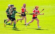 6 May 2025; Over 1000 U12 Camogie players, from across the country, were given the opportunity of a lifetime, when they got to compete on the hallowed turf at Croke Park. Allianz, a longstanding partner to the GAA and proud sponsor of The Camogie Association, welcomed under-12 teams across Ireland to Croke Park, for the Allianz Camán to Croker 2025 event. The event gives young girls the opportunity to represent their clubs and counties, in the day-long blitz – creating lots of fantastic memories and fun along the way. Allianz Camán to Croker is one of many initiatives supported by Allianz, as part of their #StopTheDrop campaign – a campaign designed to highlight and reduce the number of children dropping out of sport at the transition between primary and secondary school. Pictured at the Allianz Camán to Croker 2025 event is action between Naomh Pól of Antrim and Douglas of Cork. Photo by Ramsey Cardy/Sportsfile