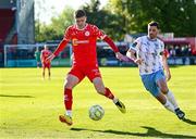 5 May 2025; Sean Gannon of Shelbourne in action against Padraig Amond of Waterford during the SSE Airtricity Men's Premier Division match between Shelbourne and Waterford at Tolka Park in Dublin. Photo by Seb Daly/Sportsfile
