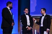 6 May 2025; Departing players Aitzol King, centre, and Rory McGuire, left, are interviewed by MC Joe Molloy during the Leinster Rugby awards ball 2025 at O'Reilly Hall in UCD, Dublin. Photo by Brendan Moran/Sportsfile