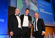 6 May 2025; Sam Prendergast is presented with the Irish Times Try of the Year award by Gerry Thornley of The Irish Times, right, and Leinster Rugby president Declan Gardiner during the Leinster Rugby awards ball 2025 at O'Reilly Hall in UCD, Dublin. Photo by Brendan Moran/Sportsfile