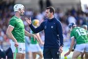 3 May 2025; Kyle Hayes of Limerick with Limerick selector Paul Kinnerk before the Munster GAA Hurling Senior Championship Round 3 match between Waterford and Limerick at Walsh Park in Waterford. Photo by Piaras Ó Mídheach/Sportsfile