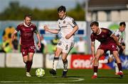 5 May 2025; Colm Whelan of Bohemians in action against Conor McCormack and Robert Slevin of Galway United during the SSE Airtricity Men's Premier Division match between Galway United and Bohemians at Eamonn Deacy Park in Galway. Photo by Brendan Moran/Sportsfile