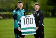8 May 2025; Aaron Greene is presented with a commemorative jersey to mark his recent achievement of scoring 100 League of Ireland goals, by manager Stephen Bradley, during a Shamrock Rovers media conference at Roadstone Group Sports Club in Dublin. Photo by Stephen McCarthy/Sportsfile