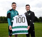 8 May 2025; Aaron Greene is presented with a commemorative jersey to mark his recent achievement of scoring 100 League of Ireland goals, by manager Stephen Bradley, during a Shamrock Rovers media conference at Roadstone Group Sports Club in Dublin. Photo by Stephen McCarthy/Sportsfile
