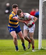 9 May 2025; Mayo goalkeeper Thomas Williams is tackled by Shay McGuinness of Roscommon during the Electric Ireland Connacht GAA Football Minor Championship final match between Roscommon and Mayo at Hastings Insurance MacHale Park in Castlebar, Mayo. Photo by Ben McShane/Sportsfile