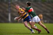9 May 2025; Tadgh Rogers of Roscommon in action against Dara Flanagan of Mayo during the Electric Ireland Connacht GAA Football Minor Championship final match between Roscommon and Mayo at Hastings Insurance MacHale Park in Castlebar, Mayo. Photo by Ben McShane/Sportsfile