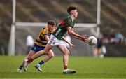 9 May 2025; Ben Holmes of Mayo in action against Christopher Feerick of Roscommon during the Electric Ireland Connacht GAA Football Minor Championship final match between Roscommon and Mayo at Hastings Insurance MacHale Park in Castlebar, Mayo. Photo by Ben McShane/Sportsfile