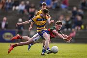 9 May 2025; John Price of Roscommon scores his side's first goal despite the attempts of Barry Langan of Mayo during the Electric Ireland Connacht GAA Football Minor Championship final match between Roscommon and Mayo at Hastings Insurance MacHale Park in Castlebar, Mayo. Photo by Ben McShane/Sportsfile