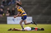 9 May 2025; John Price of Roscommon celebrates after scoring his side's first goal, as Barry Langan of Mayo reacts, during the Electric Ireland Connacht GAA Football Minor Championship final match between Roscommon and Mayo at Hastings Insurance MacHale Park in Castlebar, Mayo. Photo by Ben McShane/Sportsfile