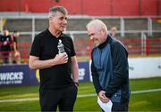 9 May 2025; St Patrick's Athletic manager Stephen Kenny speaking to LOITV commentator and former Shelbourne player Richie Baker before the SSE Airtricity Men's Premier Division match between Shelbourne and St Patrick's Athletic at Tolka Park in Dublin. Photo by Stephen McCarthy/Sportsfile