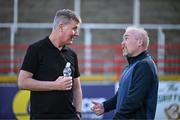 9 May 2025; St Patrick's Athletic manager Stephen Kenny speaking to LOITV commentator and former Shelbourne player Richie Baker before the SSE Airtricity Men's Premier Division match between Shelbourne and St Patrick's Athletic at Tolka Park in Dublin. Photo by Stephen McCarthy/Sportsfile