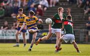 9 May 2025; John Price of Roscommon in action against Barry Langan, centre, and Cahair Tighe of Mayo during the Electric Ireland Connacht GAA Football Minor Championship final match between Roscommon and Mayo at Hastings Insurance MacHale Park in Castlebar, Mayo. Photo by Ben McShane/Sportsfile