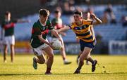 9 May 2025; Tony Carey of Mayo in action against Dara Curran of Roscommon during the Electric Ireland Connacht GAA Football Minor Championship final match between Roscommon and Mayo at Hastings Insurance MacHale Park in Castlebar, Mayo. Photo by Ben McShane/Sportsfile