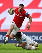 9 May 2025; Diarmuid Kilgallen of Munster is tackled by Nick Timoney of Ulster during the United Rugby Championship match between Munster and Ulster at Thomond Park in Limerick. Photo by Brendan Moran/Sportsfile