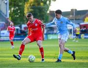 9 May 2025; JJ Lunney of Shelbourne in action against Kian Leavy of St Patrick's Athletic during the SSE Airtricity Men's Premier Division match between Shelbourne and St Patrick's Athletic at Tolka Park in Dublin. Photo by Stephen McCarthy/Sportsfile