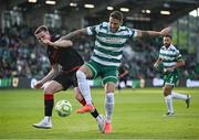 9 May 2025; Lee Grace of Shamrock Rovers in action against Warren Davis of Drogheda United during the SSE Airtricity Men's Premier Division match between Shamrock Rovers and Drogheda United at Tallaght Stadium in Dublin. Photo by David Fitzgerald/Sportsfile