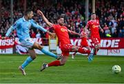 9 May 2025; Zach Elbouzedi of St Patrick's Athletic in action against Ellis Chapman of Shelbourne during the SSE Airtricity Men's Premier Division match between Shelbourne and St Patrick's Athletic at Tolka Park in Dublin. Photo by Piaras Ó Mídheach/Sportsfile