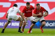 9 May 2025; Peter O'Mahony of Munster in action against Cormac Izuchukwu of Ulster during the United Rugby Championship match between Munster and Ulster at Thomond Park in Limerick. Photo by Brendan Moran/Sportsfile