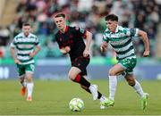 9 May 2025; Cory O'Sullivan of Shamrock Rovers in action against Warren Davis of Drogheda United during the SSE Airtricity Men's Premier Division match between Shamrock Rovers and Drogheda United at Tallaght Stadium in Dublin. Photo by Thomas Flinkow/Sportsfile
