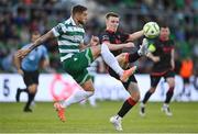 9 May 2025; Warren Davis of Drogheda United in action against Lee Grace of Shamrock Rovers during the SSE Airtricity Men's Premier Division match between Shamrock Rovers and Drogheda United at Tallaght Stadium in Dublin. Photo by David Fitzgerald/Sportsfile