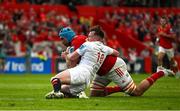 9 May 2025; Tadhg Beirne of Munster scores his side's third try despite the tackle of Jack Murphy of Ulster during the United Rugby Championship match between Munster and Ulster at Thomond Park in Limerick. Photo by Brendan Moran/Sportsfile