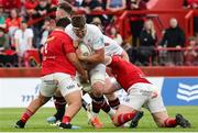 9 May 2025; James McNabney of Ulster is tackled by Michael Milne and John Hodnett of Munster during the United Rugby Championship match between Munster and Ulster at Thomond Park in Limerick. Photo by John Dickson/Sportsfile