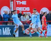 9 May 2025; Mason Melia celebrates with St Patrick's Athletic team-mates Kian Leavy, left, and Aidan Keena, right, after scoring their side's first goal during the SSE Airtricity Men's Premier Division match between Shelbourne and St Patrick's Athletic at Tolka Park in Dublin. Photo by Stephen McCarthy/Sportsfile