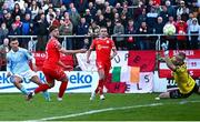 9 May 2025; Mason Melia of St Patrick's Athletic, left, scores his side's first goal during the SSE Airtricity Men's Premier Division match between Shelbourne and St Patrick's Athletic at Tolka Park in Dublin. Photo by Piaras Ó Mídheach/Sportsfile