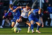 9 May 2025; Leo Gaxha of Dundalk in action against Rhys Knight, left, and Cian Doyle of Bray Wanderers during the SSE Airtricity Men's First Division match between Dundalk and Bray Wanderers at Oriel Park in Dundalk, Louth. Photo by Tyler Miller/Sportsfile