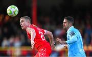 9 May 2025; Evan Caffrey of Shelbourne in action against Zach Elbouzedi of St Patrick's Athletic during the SSE Airtricity Men's Premier Division match between Shelbourne and St Patrick's Athletic at Tolka Park in Dublin. Photo by Stephen McCarthy/Sportsfile