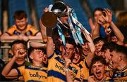 9 May 2025; Roscommon captain Dara Curran, centre, lifts the cup alongside his teammates after the Electric Ireland Connacht GAA Football Minor Championship final match between Roscommon and Mayo at Hastings Insurance MacHale Park in Castlebar, Mayo. Photo by Ben McShane/Sportsfile