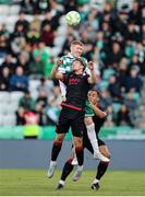9 May 2025; Darragh Nugent of Shamrock Rovers in action against Drogheda United players Owen Lambe, front, and Douglas James-Taylor during the SSE Airtricity Men's Premier Division match between Shamrock Rovers and Drogheda United at Tallaght Stadium in Dublin. Photo by Thomas Flinkow/Sportsfile