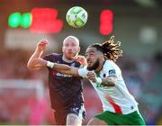 9 May 2025; Milan Mbeng of Cork City in action against Liam Boyce of Derry City during the SSE Airtricity Men's Premier Division match between Cork City and Derry City at Turner's Cross in Cork. Photo by Michael P Ryan/Sportsfile