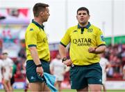 9 May 2025; Referee Adam Jones consults with assistant Paul Haycock regarding a foul play incident during the United Rugby Championship match between Munster and Ulster at Thomond Park in Limerick. Photo by John Dickson/Sportsfile