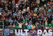 9 May 2025; Drogheda United supporters celebrate after a penalty by Graham Burke of Shamrock Rovers hits the post during the SSE Airtricity Men's Premier Division match between Shamrock Rovers and Drogheda United at Tallaght Stadium in Dublin. Photo by Thomas Flinkow/Sportsfile