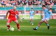 9 May 2025; Kerr McInroy of Shelbourne in action against Kian Leavy of St Patrick's Athletic during the SSE Airtricity Men's Premier Division match between Shelbourne and St Patrick's Athletic at Tolka Park in Dublin. Photo by Piaras Ó Mídheach/Sportsfile