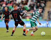 9 May 2025; Jack Byrne of Shamrock Rovers in action against Shane Farrell of Drogheda United during the SSE Airtricity Men's Premier Division match between Shamrock Rovers and Drogheda United at Tallaght Stadium in Dublin. Photo by Thomas Flinkow/Sportsfile