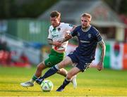9 May 2025; Carl Winchester of Derry City in action against Evan McLaughlin of Cork City during the SSE Airtricity Men's Premier Division match between Cork City and Derry City at Turner's Cross in Cork. Photo by Michael P Ryan/Sportsfile