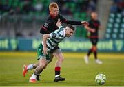 9 May 2025; Jack Byrne of Shamrock Rovers in action against Shane Farrell of Drogheda United during the SSE Airtricity Men's Premier Division match between Shamrock Rovers and Drogheda United at Tallaght Stadium in Dublin. Photo by David Fitzgerald/Sportsfile