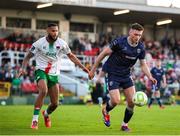 9 May 2025; Hayden Cann of Derry City in action against Djenairo Daniels of Cork City during the SSE Airtricity Men's Premier Division match between Cork City and Derry City at Turner's Cross in Cork. Photo by Michael P Ryan/Sportsfile