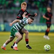 9 May 2025; Jack Byrne of Shamrock Rovers in action against Shane Farrell of Drogheda United during the SSE Airtricity Men's Premier Division match between Shamrock Rovers and Drogheda United at Tallaght Stadium in Dublin. Photo by David Fitzgerald/Sportsfile