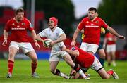 9 May 2025; Michael Lowry of Ulster is tackled by Tom Farrell of Munster during the United Rugby Championship match between Munster and Ulster at Thomond Park in Limerick. Photo by Brendan Moran/Sportsfile