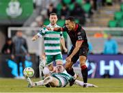 9 May 2025; Douglas James-Taylor of Drogheda United is tackled by Darragh Nugent of Shamrock Rovers during the SSE Airtricity Men's Premier Division match between Shamrock Rovers and Drogheda United at Tallaght Stadium in Dublin. Photo by Thomas Flinkow/Sportsfile
