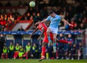 9 May 2025; Joe Redmond of St Patrick's Athletic in action against Mipo Odubeko of Shelbourne during the SSE Airtricity Men's Premier Division match between Shelbourne and St Patrick's Athletic at Tolka Park in Dublin. Photo by Stephen McCarthy/Sportsfile